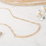 Gold/Crystal Curved Bar Necklace