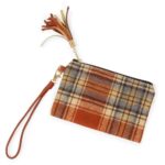 Wristlet featuring faux leather tassel zipper pull